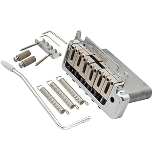 Fits for most modern American Standard or Professional Stratocaster(1987-now) with 2-Point style ST tremolo bridge. It will NOT fit a Squier Strat String spacing:10.5x5= 52.5mm(2-1/16 inch) ; stud spacing: 56mm(2-7/32 inch), 2 studs Push-in tremolo a...