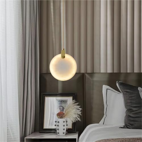 Suspension de chevet LED en marbre pour créer une ambiance cocooning dans votre chambre