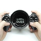 Los amantes de los videojuegos, se puede enfriar con placer durante todo el día con esta taza de cerámica disponible. La causa es el diseño imitando a un contenedor controlador de videojuegos.