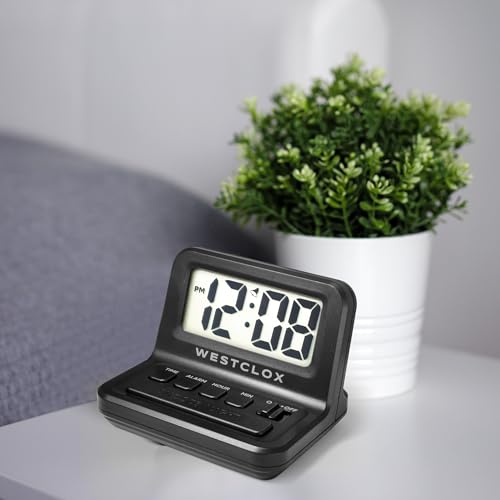 Image of Westclox LCD Digital Bedside Alarm Clock with White Backlit Display and Snooze Function, Battery Operated, (Black, 3-Inch)