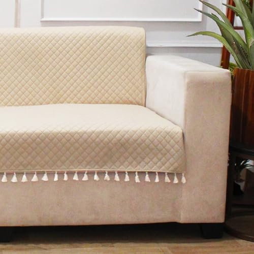 Image of STITCHNEST 'Maison Plush Series' Quilted Velvet Sofa Cover 1 Seater Fully Covered | Premium Soft Fabric, Washable & Fade Resistant | Beige Sofa Protector with Tassels | Size 24x60 Inch