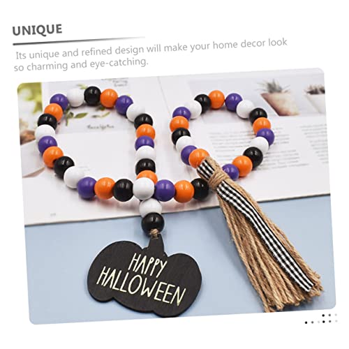 Guirlande perles de bois avec pompons decoration rustique