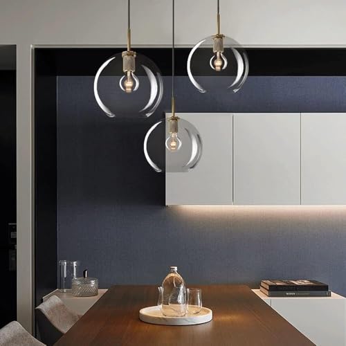 Lampes à suspension en verre et finitions cuivre d'architecte