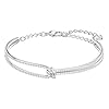 SWAROVSKI Lifelong Bangle Bracelet, Lovers Knot Design with Delicate Clear Crystal Pavé on a Rhodium Finish Setting, Part of the Swarovski Lifelong Collection