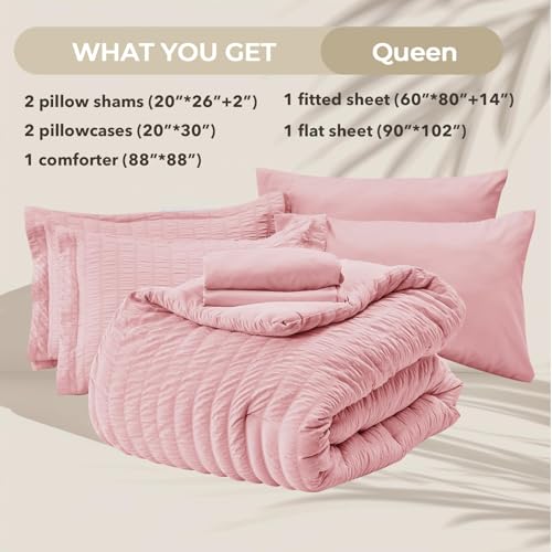 Image of HYMOKEGE Pink Queen Comforter Set Seersucker 7 Pieces, All Season Luxury Bed in a Bag for Bedroom, Bedding Set with Comforters, Sheets, Pillowcases & Shams
