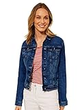 La chaqueta vaquera en lavado azul oscuro es un todoterreno y puede utilizarse de muchas maneras