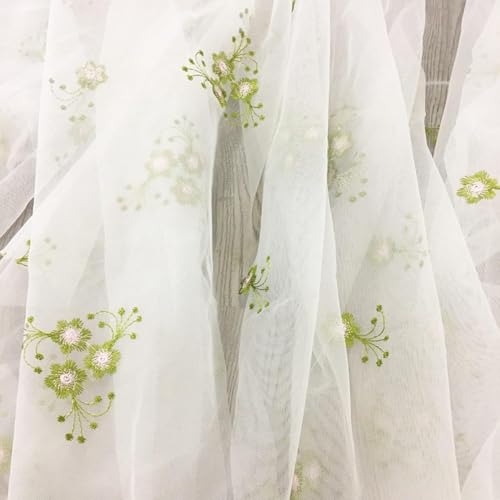Tissu organza raffiné avec broderie maille pour confection de robe de soirée