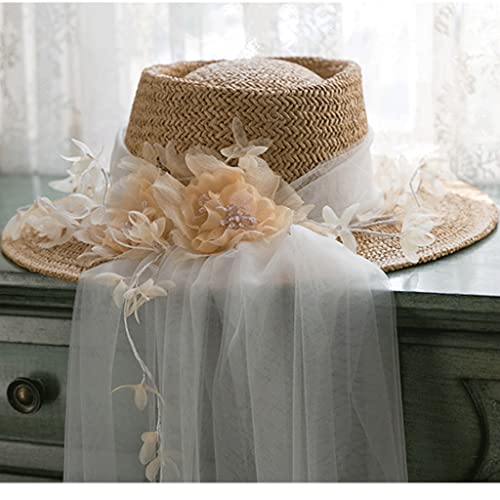 Chapeau vintage avec voile pour un shooting photo élégant et rétro à la plage