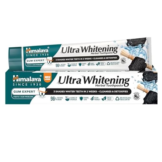 Himalaya Pasta de Dientes Ultra Whitening - Fórmula Herbal con Carbón Activado de Coco y Aceite de Semillas Negras, Sin Flúor, 100% Vegana, Limpia y Blanquea los Dientes en 3 Tonos, 75ml