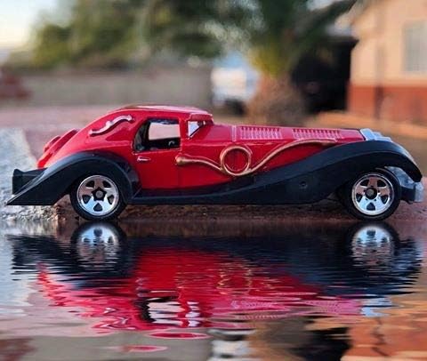 Miniatura 6 de Hot Wheels 2018 50th Anniversary HW Screen Time Disney 101 Dalmations Cruella De Vil 343365 rojo