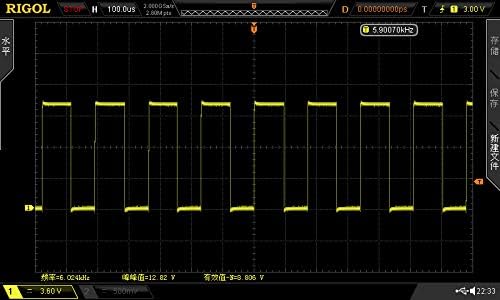 Oscilloscope display showing a square wave output with a frequency of 5.90070 kHz.