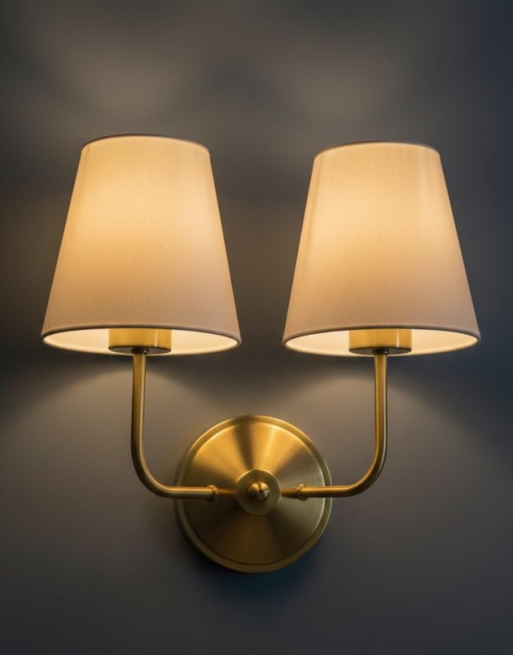 Image of Royal Aura Vintage Gold Wall Lamp | Classic Cream Fabric Pleated Shade | Dual Arm Metal Frame | Decorative Lighting Fixture for Living Room & Bedroom