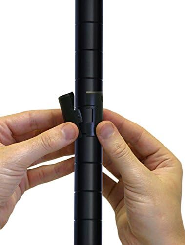Image of hands attaching a black plastic clip to a metal shelving post