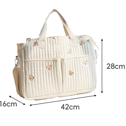 Panier à langer velours marron pour organiser les couches sur la commode de bébé