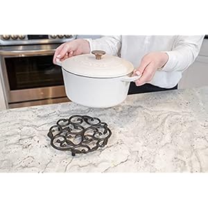 GASARÉ, Cast Iron Trivet for Hot Dishes, Pots, and Pans, Metal Trivet, Vine Plant Design, Rubber Feet Caps, Ring Hanger, 8 Inches, Brown, 1 Unit GASARE Cast Iron Trivet for Hot Dishes Pots and Pans Metal Trivet Vine Plant Design Rubber Feet Caps Ring Hanger 8 Inches Brown 1 Unit