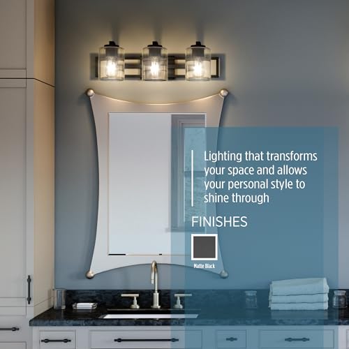 Image of Quoizel Lansdowne Modern Bath Vanity Lights, 24 Inch 3-Light Matte Black Lighting Fixtures Over Mirror, Clear Glass Shade, 100W, Decorative Wall Light for Bathroom, Dresser, Kitchen or Hallway