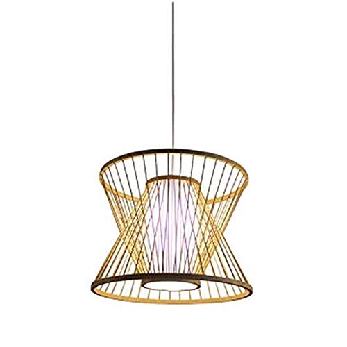 Luminaires suspendus en osier pour éclairer une table de salle à manger boho
