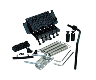 Material: iron bridge and tremolo arm, brass block, and zinc alloy saddle. 6 string double roll electric guitar tremolo bridge system set. Includes full bridge mounting hardware. Easy to install and easy access. Great for luthier and DIY projects. Pl...