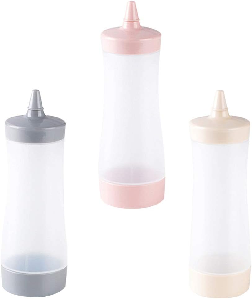 spremere la bottiglia per i biscotti con la glassa