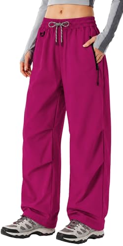 Image of FEOYA Waterproof Pants Women Light Rain Pants Parachute Drawstring Cuffs | Elastic Drawstring Waist,Zipper Large Pockets,Quick-Dry Water-Repellent Baggy Cargo Pants,Camping Hiking Pants Travel Casual