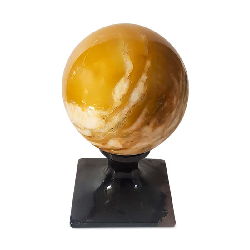 Boule en marbre jaune de Sienne et socle noir pour déco de salon