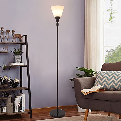 Lampadaire en verre créant une ambiance douce dans la chambre