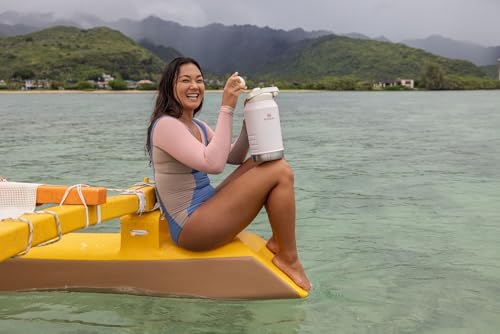 Image of Stanley IceFlow Fast Flow Jug with Handle 64 oz | Twist On Angled Spout Lid | Leakproof for Travel and Sports | Insulated Stainless Steel | BPA-Free | Rose Quartz 2.0