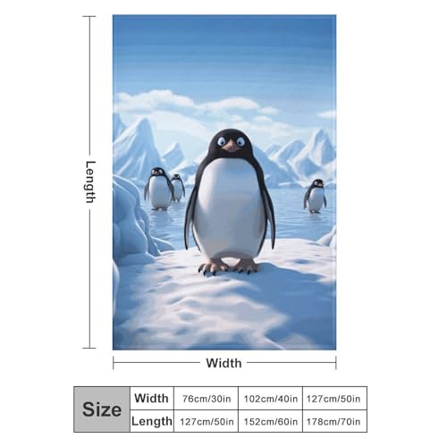 Couverture flanelle pingouin pour soirée cocooning sur le canapé