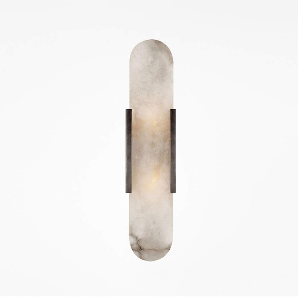 Lámpara de pared de mármol soluciona falta de luz decorativa en zonas de paso oscuras