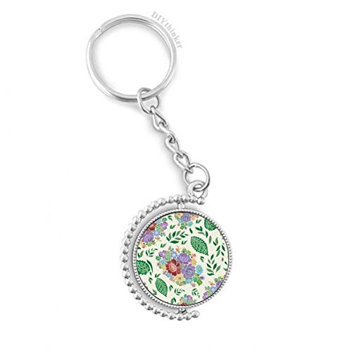 Llavero giratorio con grabado de flores de Chino y acabado de alta fidelidad
