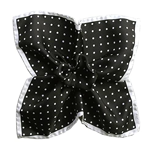 Pochette dandy Segni en soie noire résout le problème des pliages de costume plats