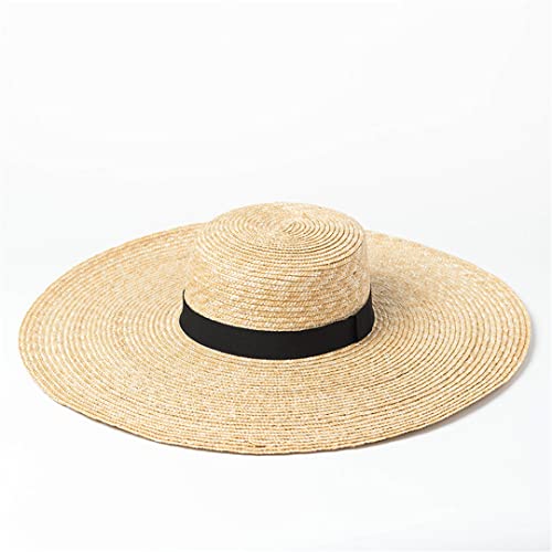 Chapeau de paille à grand bord : l'accessoire femme chic et surdimensionné de l'été