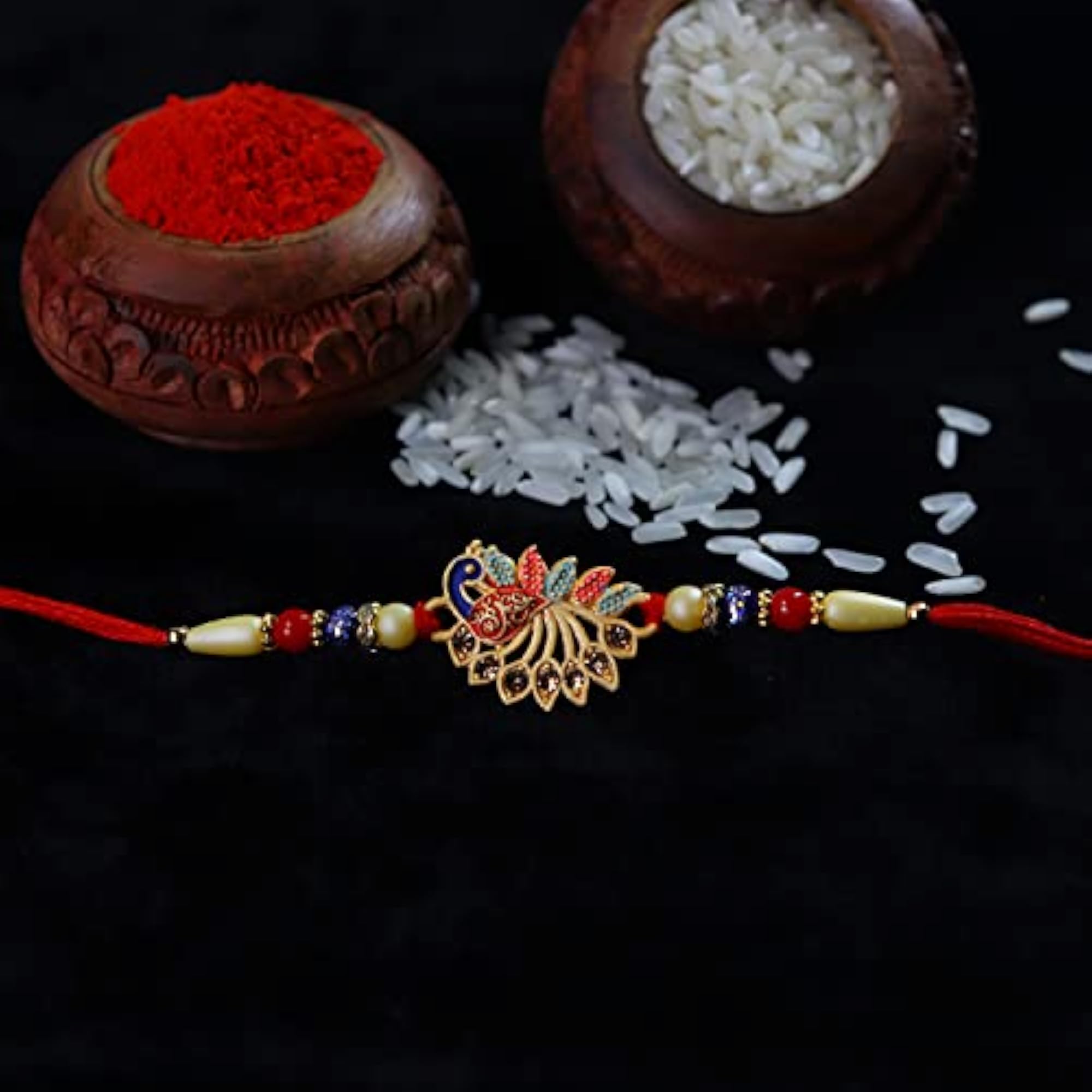 Fancy Peacock Rakhi with Ganesh Ji Pooja Thali Combo for Brother