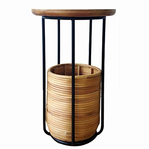 Mesa revistero pequeña para resolver el desorden junto al sofá del salón 2