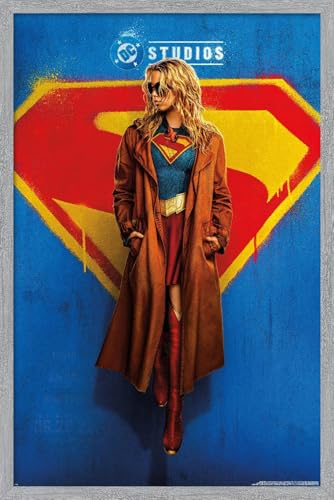 Trends International DC Studios Supergirl (2026) - Whatever Teaser One Sheet Wall Poster, 34L x 22.4W, Gray Framed Version