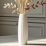 Aspect élégant : La forme sculpturale moderne fait de la vase un élément de décoration élégant pour votre décoration intérieure et de salon.