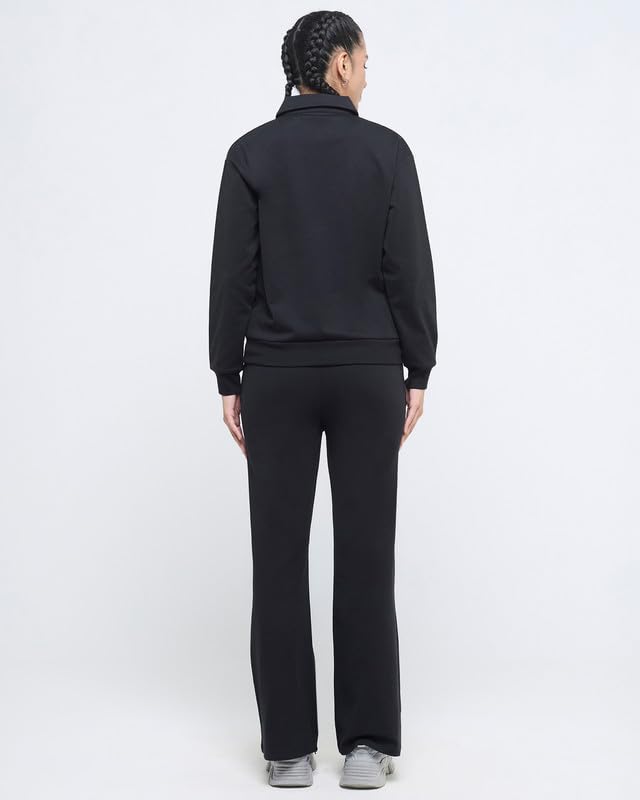 Image of HUNNIT Essential Flare Pants for Women with Zip Pockets | Mid Waist Solid Cotton Tapered Flare Pants | Bootcut Flared Trousers with Wide Elastic Waistband | Relaxed Fit Flared Trouser