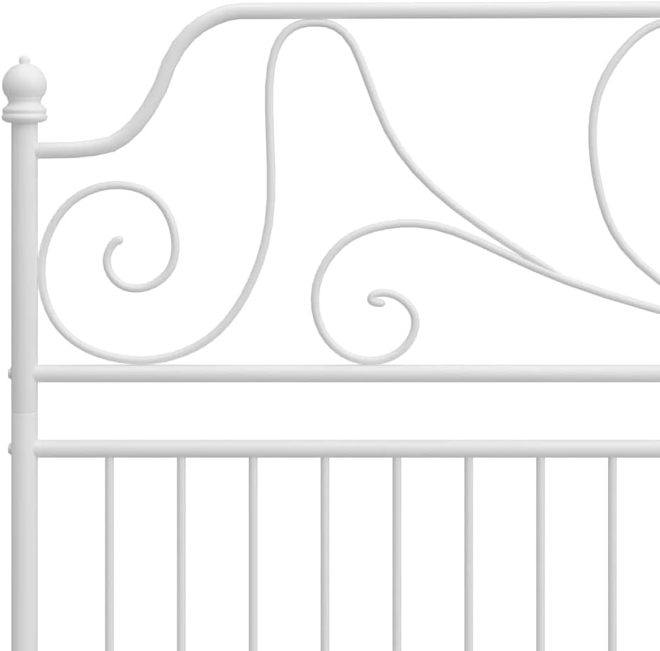 Close-up view of the decorative headboard design of the white metal bed frame