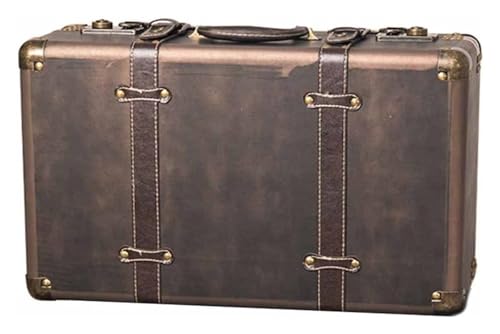 Valise vintage en cuir pour ranger avec élégance et décorer une vitrine