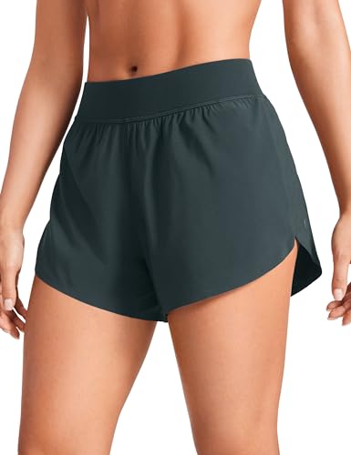 CRZ YOGA Mid Waisted Dolphin Athletic Shorts for Women Lightweight High Split Gym Workout Shorts with Liner Quick Dry Melanite Medium