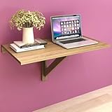 Cette table économique en espace peut être fixée au mur à n'importe quelle hauteur souhaitée.