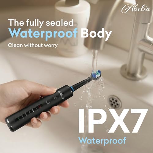 Image of Abelia Rotating Electric Toothbrush for Adults | Rechargeable Oscillating Brush | 8 Round Heads, 5 Modes, 3 Intensity Levels, 2 Min Timer | Waterproof | 2-Year Warranty | Black