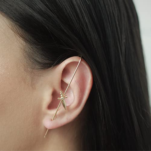 Brinco com piercing fake transversal com adaga folheado em ouro 18k