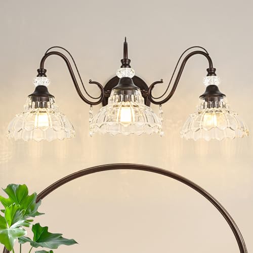 Image of Vintage Bathroom Vanity Light, 3-Light Oil Rubbed Bronze Finish Wall Sconce with Hanging Crystal Accents and Flower-Shaped Clear Glass Shades, Retro Wall Mount Vanity Light Over Mirror for Bathroom