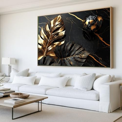 Tableau Monstera or et noir pour décoration salon chic et moderne