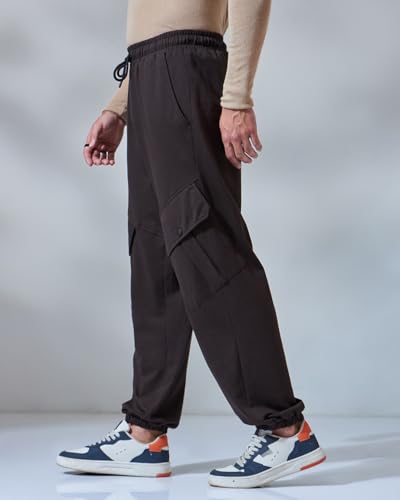 Image of Bewakoof Men's Cotton Super Loose Fit Joggers|Bewakoof Air 1.0 | Track pants for man | Lower for man | Trouser for men | Baggy trackpants for men | Multipurpose | Mens Lower Activewear | Utility Pockets | Lightweight & Flexible Elastic Waist | Casual Joggers | Loose Fit