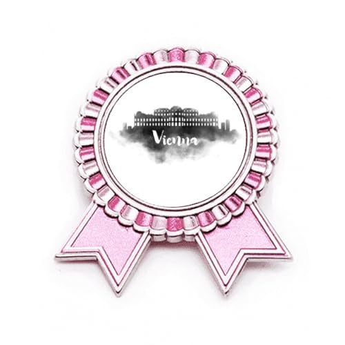 Broche Vienne rose en métal pour sublimer un manteau lors d'un vernissage