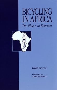 Paperback Bicycling in Africa: The Places in Between Book