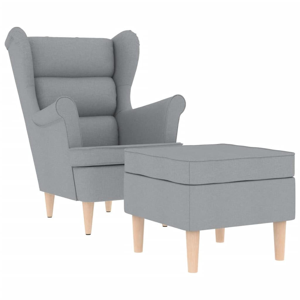 Fauteuil de relaxation gris clair et son repose-pied pour vos soirées lecture au salon