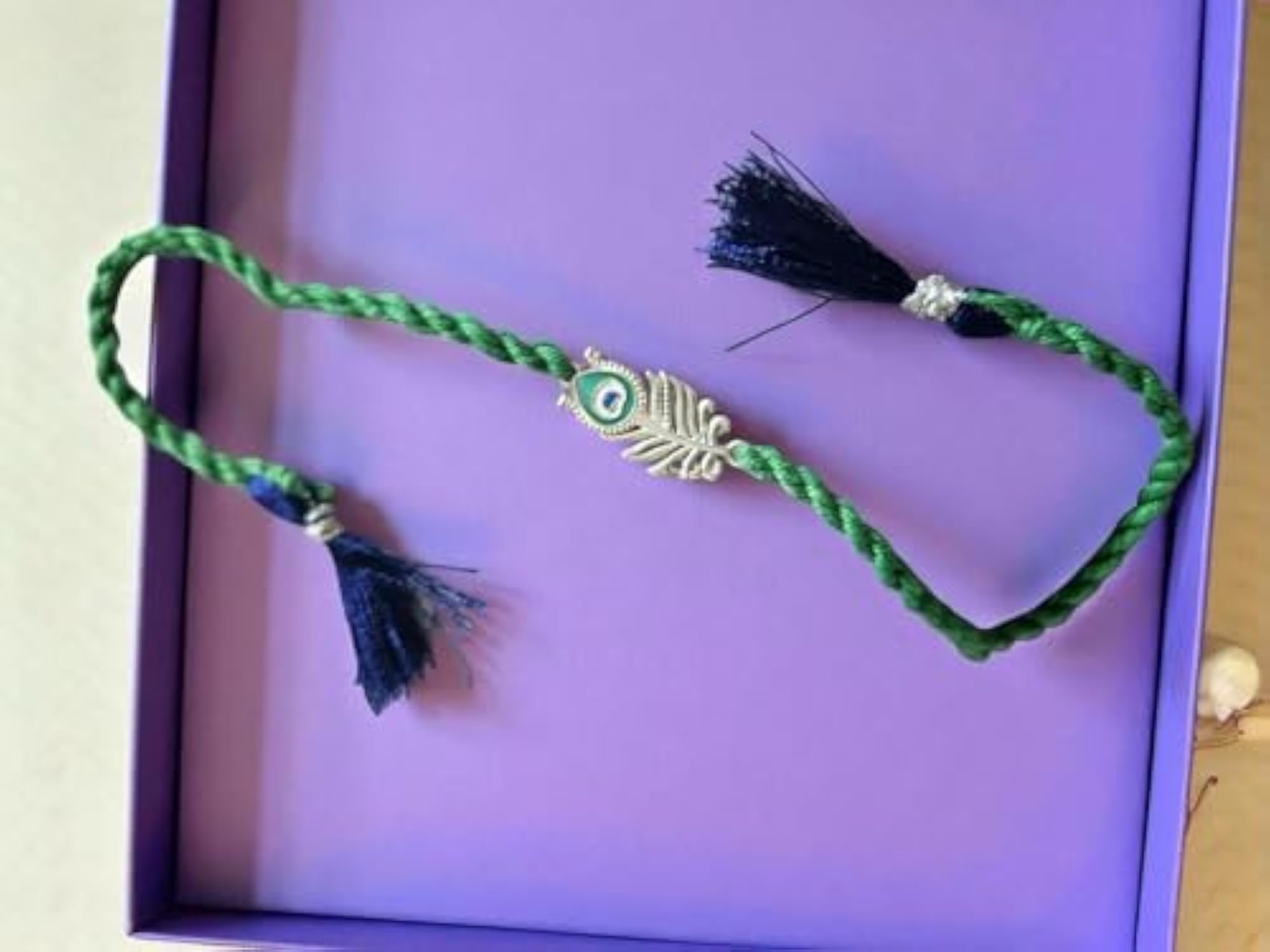 925 Silver Peacock Feather Rakhi with Kumkum & Chawal Bottle